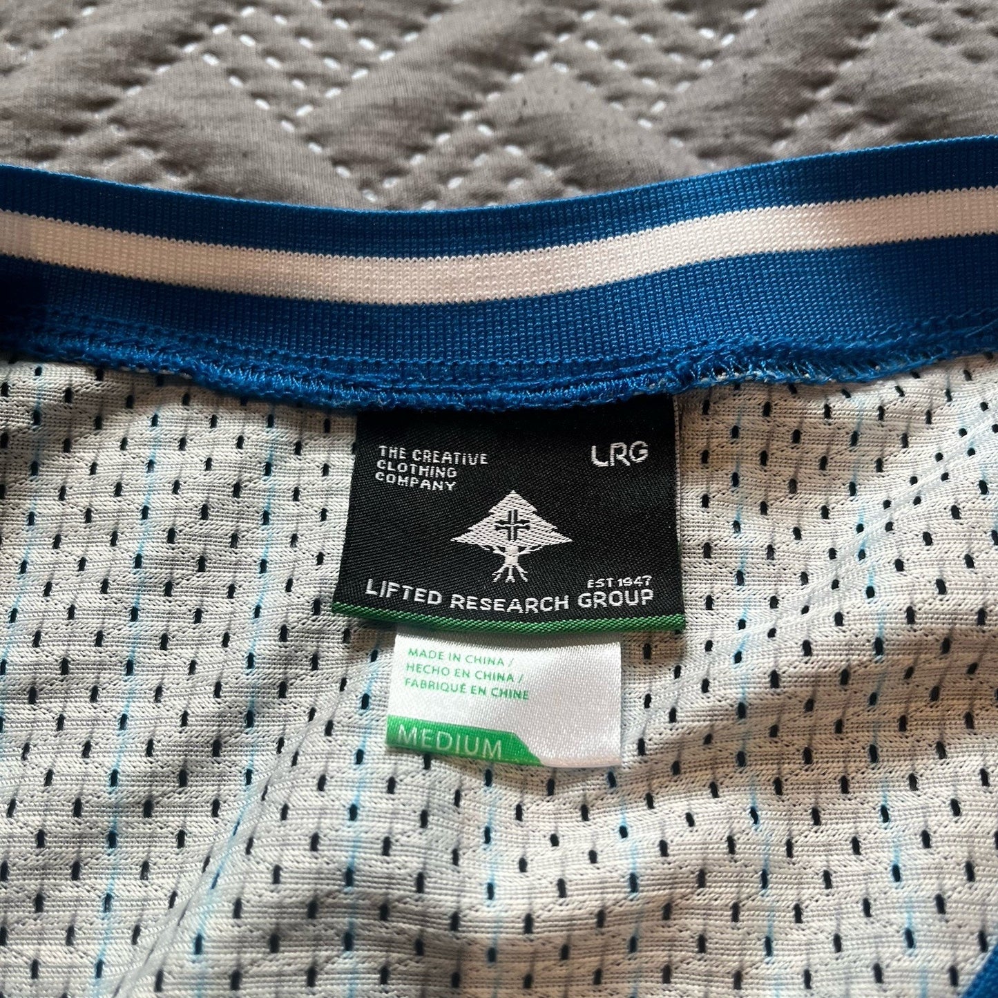 LRG Lifted research group Men's L black/blue striped logo basketball #47 jersey